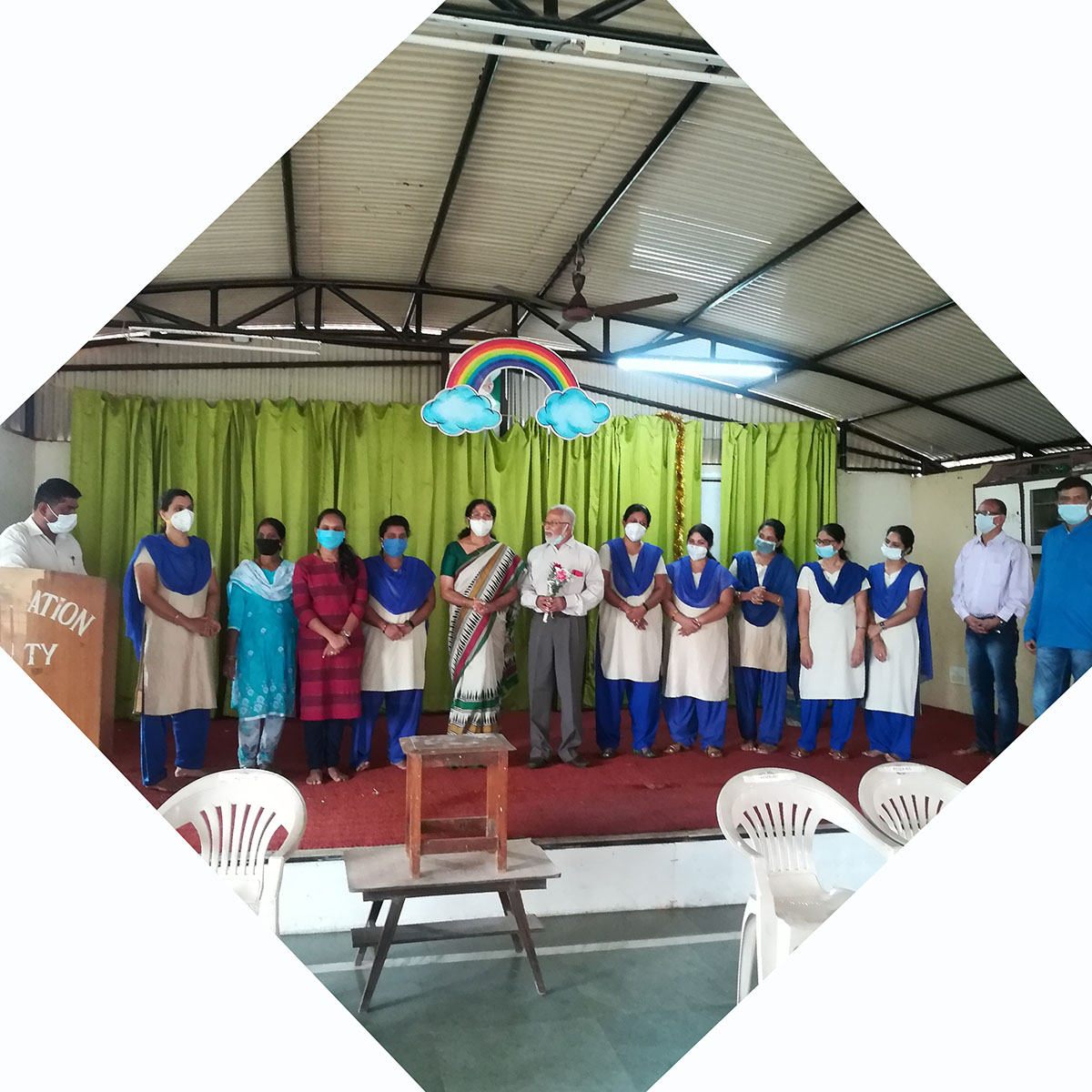 Principal Mr. Cherian Kurvilla (centre with flowers), along with teachers of Airway Public School. Vidyanagar Association Secretary Shri Ganesh Lamani (on left), anchored the event.