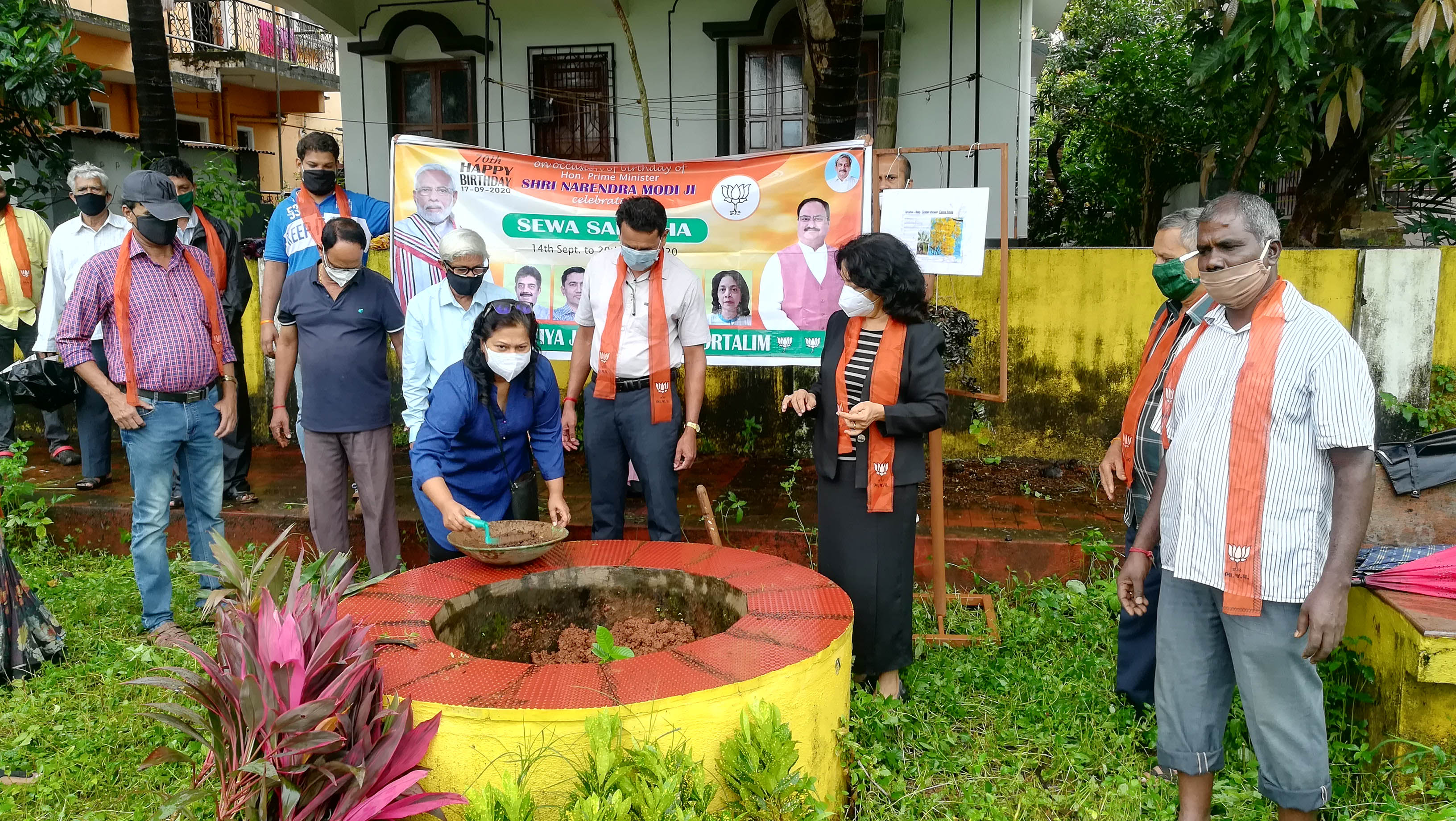 Seen in above picture, local resident Smt Varsha Naik, lending a hand in planting a sapling during the 3rd Van Mahotsav day being celebrated in Vidyanagar at Sidharth colony garden.