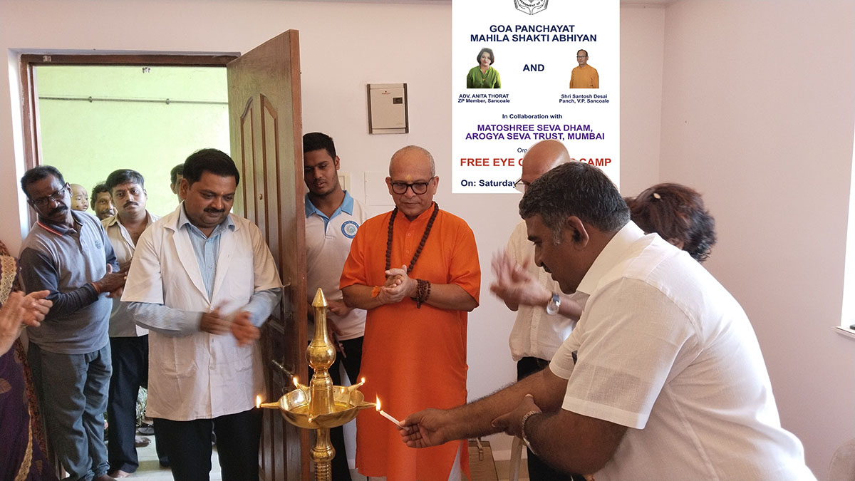 Vidyanagar Association President Shri Monesh Meti lighting traditional lamp inaugurating the eye camp.