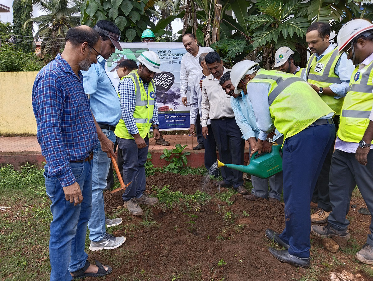 Seen here is Shri Gurumurthy Venkat Murty of L&T watering the plant. Also in picture is Ex-President of Vidyanagar Residents Welfare Association; Shri Santosh Desai (checked blue shirt),  Mr. Wilfred Fernandes, Mr.Jayant Prabhakar Gosavi, Project Manager,  L&T Ltd., Adora De Goa Project.  Association Secretary Shri Ganesh Lamani (right), President Shri Monesh Meti and other members of the L&T team.