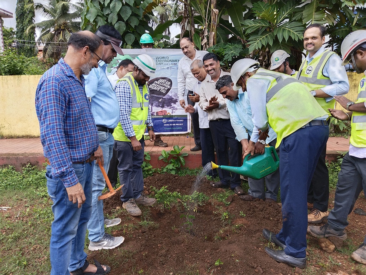 Seen here is Shri Gurumurthy Venkat Murty of L&T watering the plant. Also in picture is Ex-President of Vidyanagar Residents Welfare Association; Shri Santosh Desai (checked blue shirt),  Mr. Wilfred Fernandes, Mr.Jayant Prabhakar Gosavi, Project Manager,  L&T Ltd., Adora De Goa Project.  Association Secretary Shri Ganesh Lamani (right), President Shri Monesh Meti and other members of the L&T team.