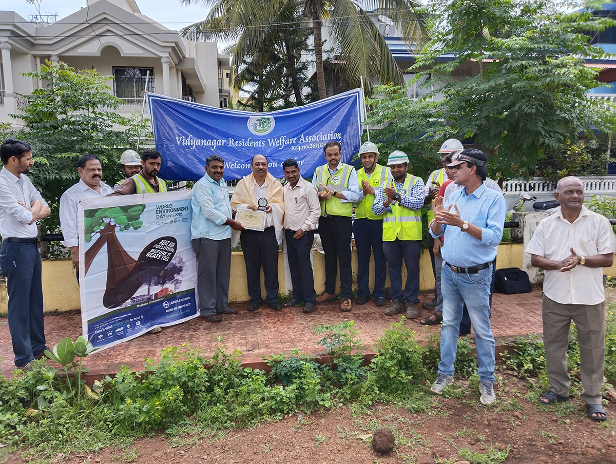 Seen here is Vidyanagar Residents Welfare Association; President Shri Monish Meti presenting a memento to Project Manager,  L&T Ltd., Adora De Goa Project as a token of appreciation for L&T's support in the Green Vision project. Also seen is association secretary Shri Ganesh Lamani, Mr.Jagdeep Naidu , Deputy Project Manager, Mr. Nandan Sah, Shri Gurumurthy Venkat Murty, Planning Head,  Mr.Sachin Patil ,Planning Manager, Mr.Ravindaranatha , IR Manager, Mr.Vengadesan, Construction Manager,  Mr.Saravanan, Construction Manager,  Mr.Raja Sekar , EHS Manager, Mr.Sujin EHS Head, Provident Housing Ltd., Mr.Muthu Kumar , QA/QC Head Provident Housing Ltd, association members Mr. Wilfred Fernandes and Mr. Kanade.