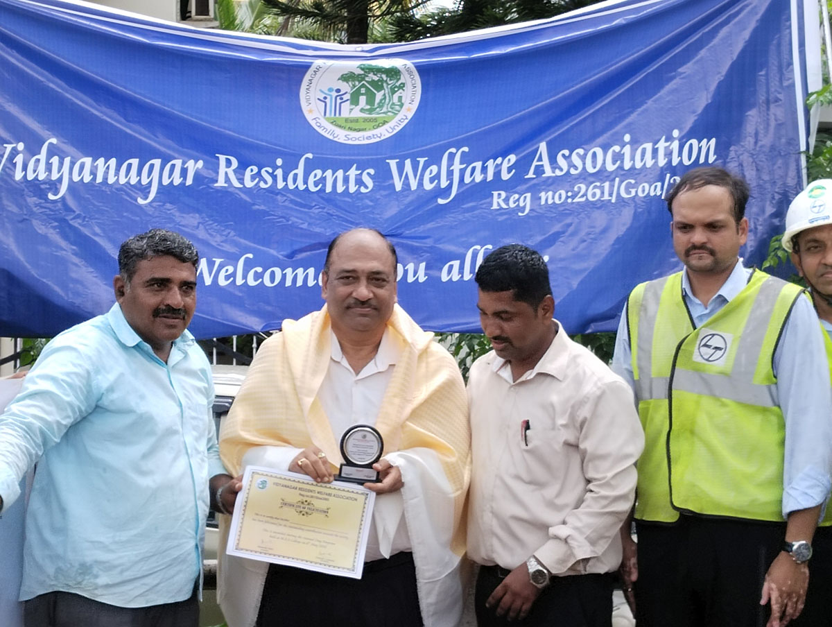 Seen here is Vidyanagar Residents Welfare Association; President Shri Monish Meti presenting a memento to Project Manager,  L&T Ltd., Adora De Goa Project as a token of appreciation for L&T's support in the Green Vision project. Also seen is association secretary Shri Ganesh Lamani, Mr.Jagdeep Naidu , Deputy Project Manager and Mr. Nandan Sah