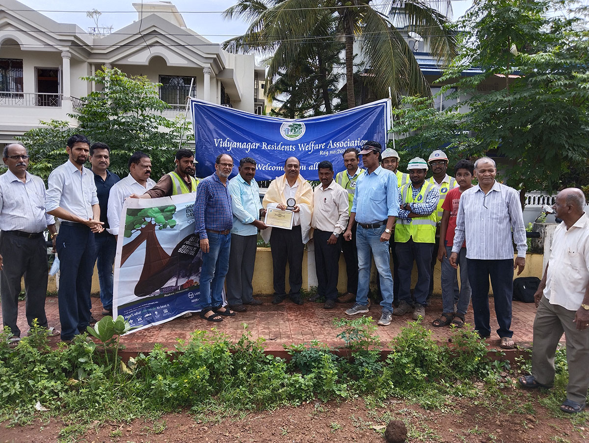 Seen here is Vidyanagar Residents Welfare Association; President Shri Monish Meti presenting a memento to Project Manager,  L&T Ltd., Adora De Goa Project as a token of appreciation for L&T's support in the Green Vision project. Also seen is association secretary Shri Ganesh Lamani (on the right) and Ex-President Shri Santosh Desai (on the left), Mr.Jagdeep Naidu , Deputy Project Manager, Mr. Nandan Sah, Shri Gurumurthy Venkat Murty, Planning Head,  Mr.Sachin Patil ,Planning Manager, Mr.Ravindaranatha , IR Manager, Mr.Vengadesan, Construction Manager,  Mr.Saravanan, Construction Manager,  Mr.Raja Sekar , EHS Manager, Mr.Sujin EHS Head, Provident Housing Ltd., Mr.Muthu Kumar , QA/QC Head Provident Housing Ltd, association members Shri Rajaram Patil, Mr. Wilfred Fernandes and Mr. Kanade (right side) and Shri L.T Naik and Shri Surendra Naik (left side).