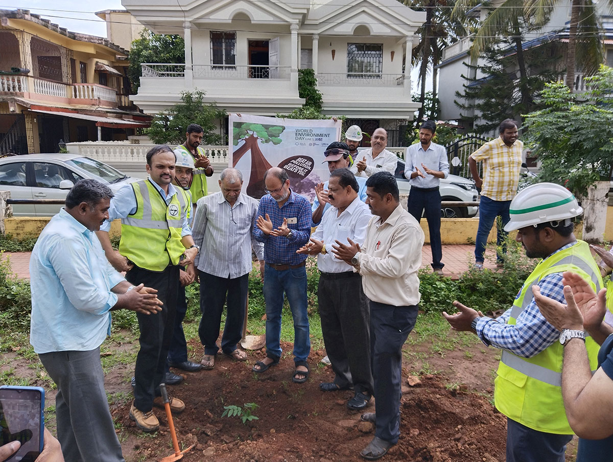 Seen here are Vidyanagar Residents Welfare Association; President Shri Monish Meti (left) along with Shri Gurumurthy venkat Murty - in helmet  who had just planted a sapling. In the foreground are Shri Rajaram Patil, Shri L.T Naik (white shirt foreground), ex_President Shri Santosh Desai (in Jeans),  Secretary Shri Ganesh Lamani, Shri Wilfred Fernandes (blue shirt) and other members of the L&T team which included Shri Jayant Prabhakar Gosavi, Project Manager,  L&T Ltd., Adora De Goa Project (in the background near the banner).