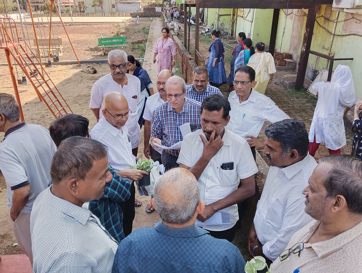 People at the gathering taking the opportunity to speak with the MLA.