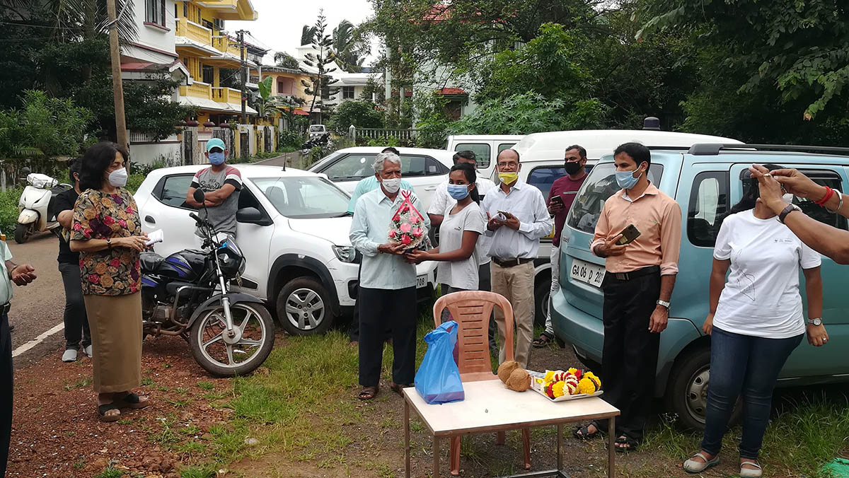 Resident elder Shri Subash Naik being felicitated.