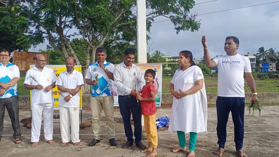 Felicitation of Yoga instructors of the Vidyanagar Yoga Group for conducting the International Yoga Day at M.E.S. College Basketball court on 19-Jun-2022.